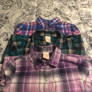Three girls button down blouses